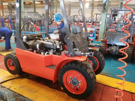 Forklift assembly with industrial tires in the factory